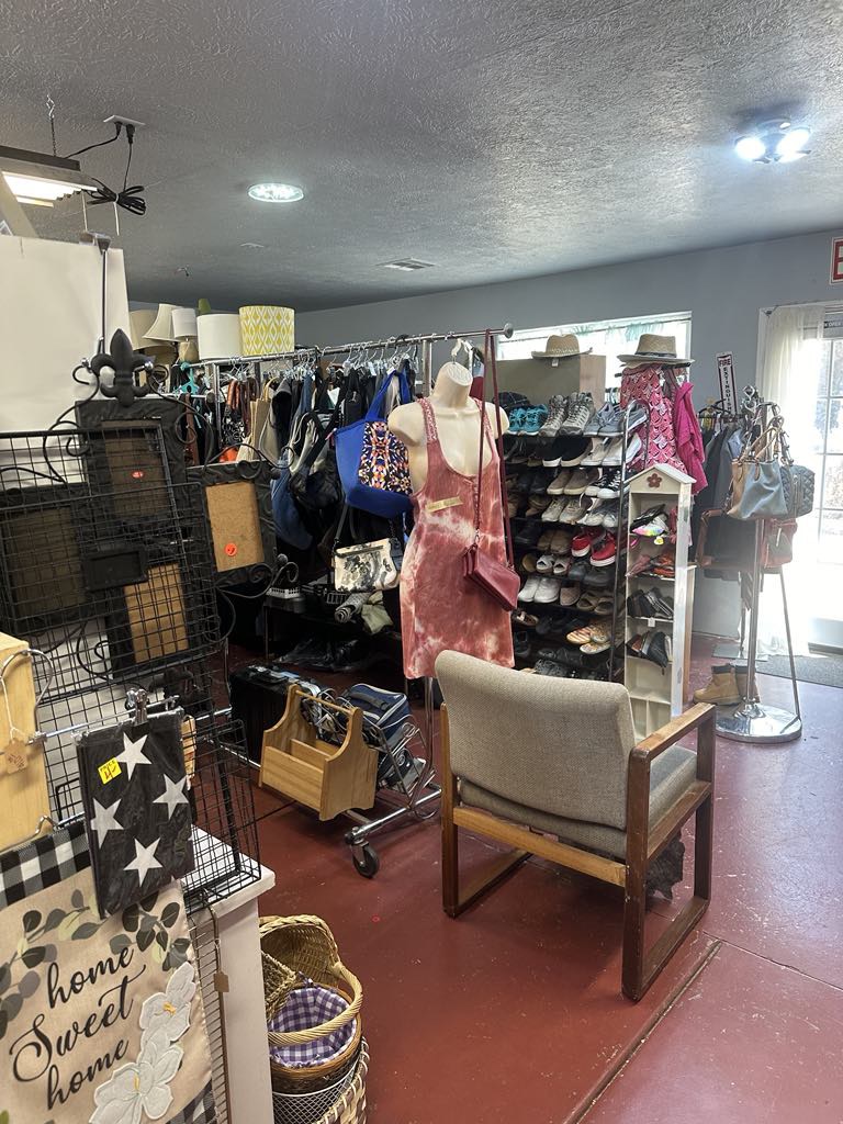 Clothing, shoes, furniture, and decor inside BAM Thrift