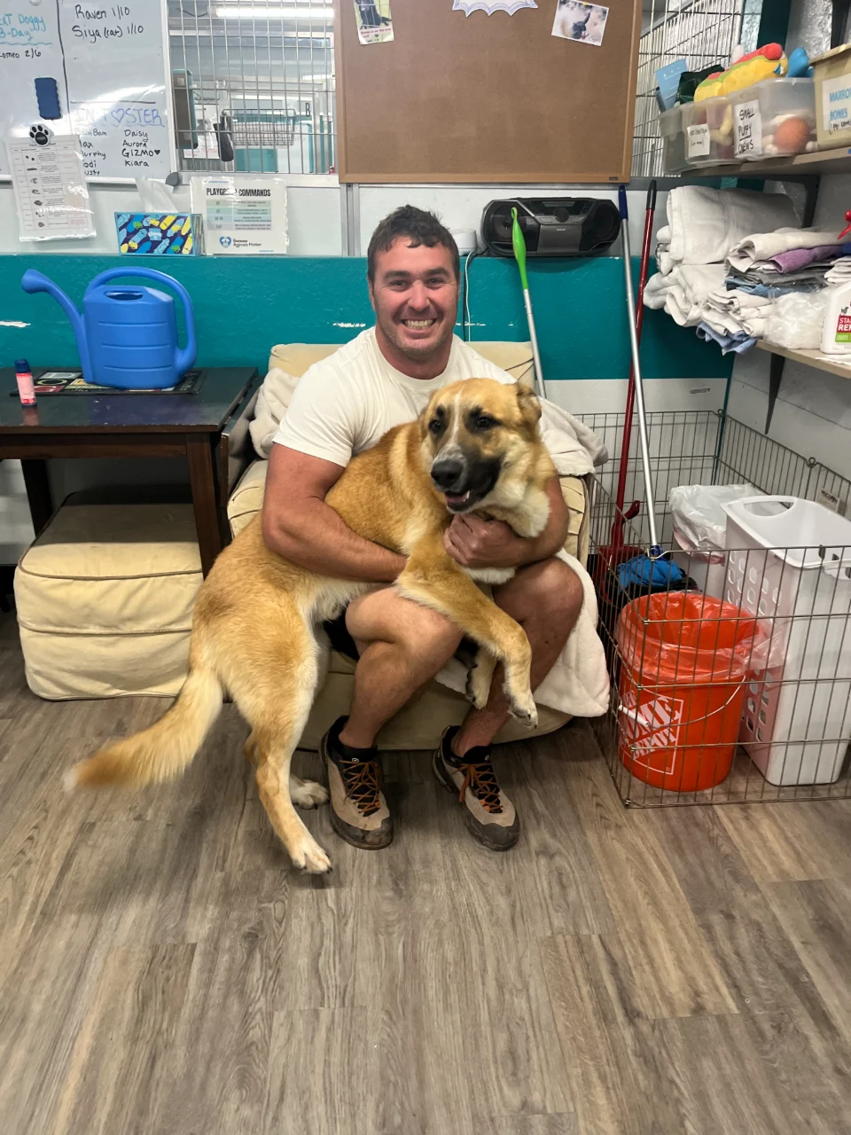 BAM volunteer Joe spending time with Rufus at the Adoption Center